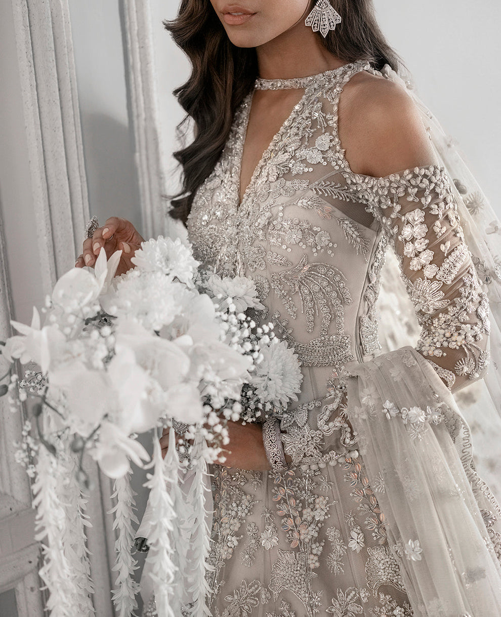  Republic Womenswear E-52 modern glamour ensemble featuring intricate embellishments and artful embroidery on luxurious fabric with a flattering flowing silhouette, perfect for galas, special occasions, and formal events.