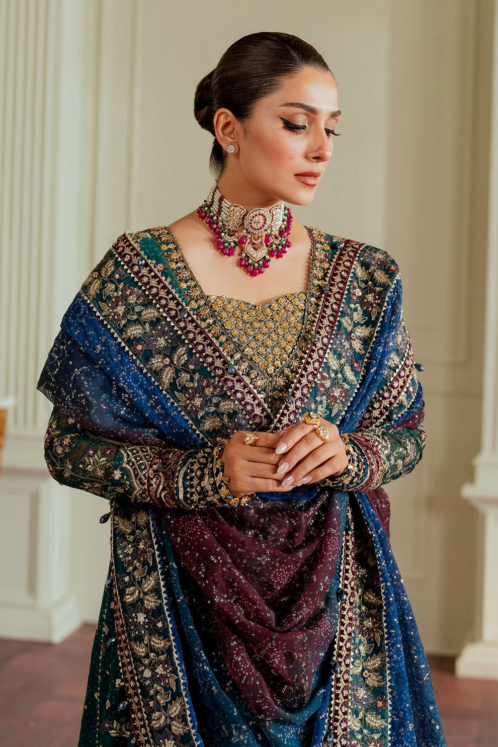Baroque Chantelle embroidered chiffon three-piece ensemble featuring a digital chunri print with hand-embellished gotta, nakshi, and copper tilla at the neckline, adorned with sequins and embroidered borders, paired with a printed chiffon dupatta with organza and velvet embroidered border and dyed silk trousers, perfect for formal occasions and festive wear.