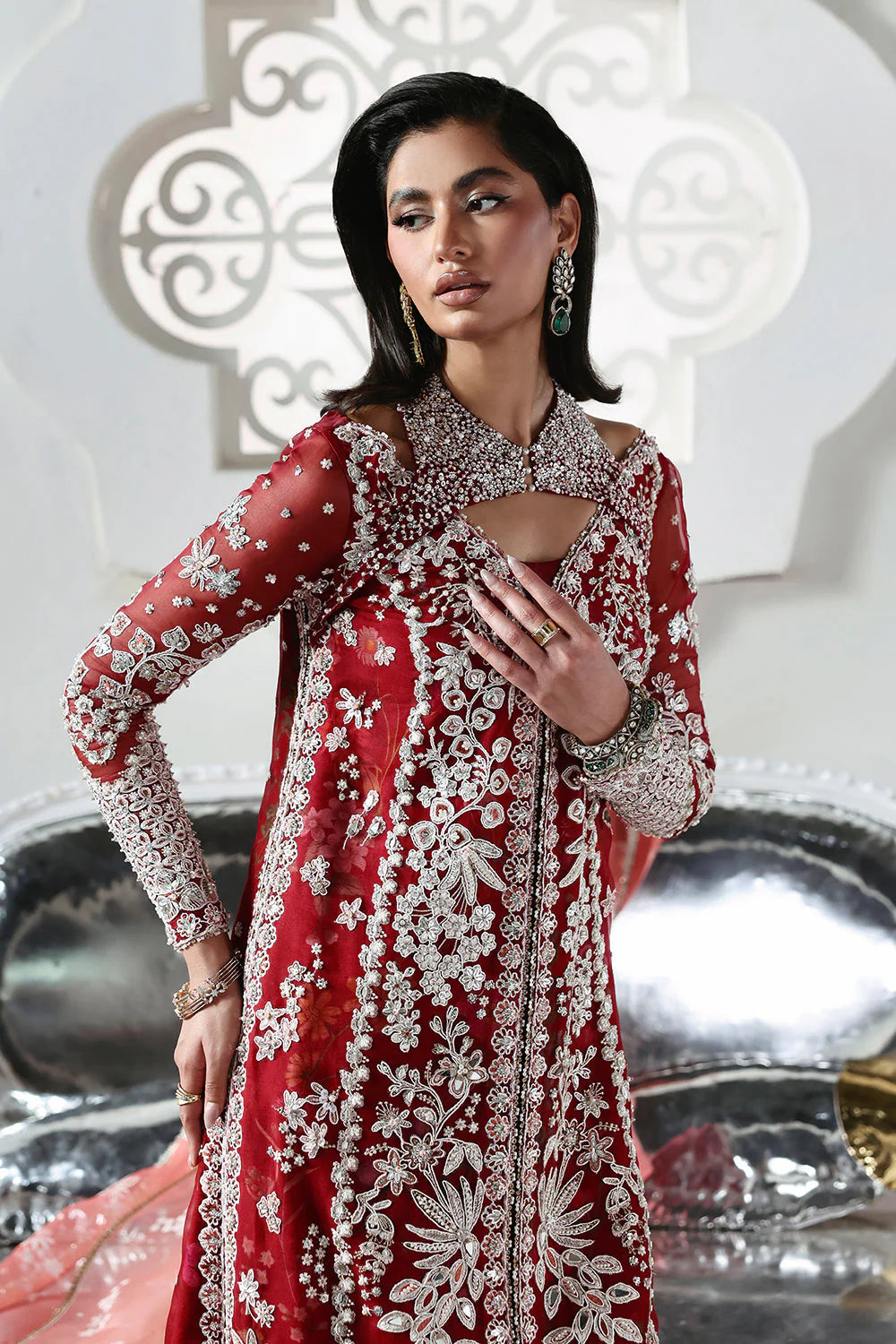 Soraya Solara Pakistani designer festive luxury ensemble with a soft luminous aesthetic and beautifully curated detailing, featuring a refined balance of texture and harmony, creating an effortlessly graceful couture look for modern festive occasions.
