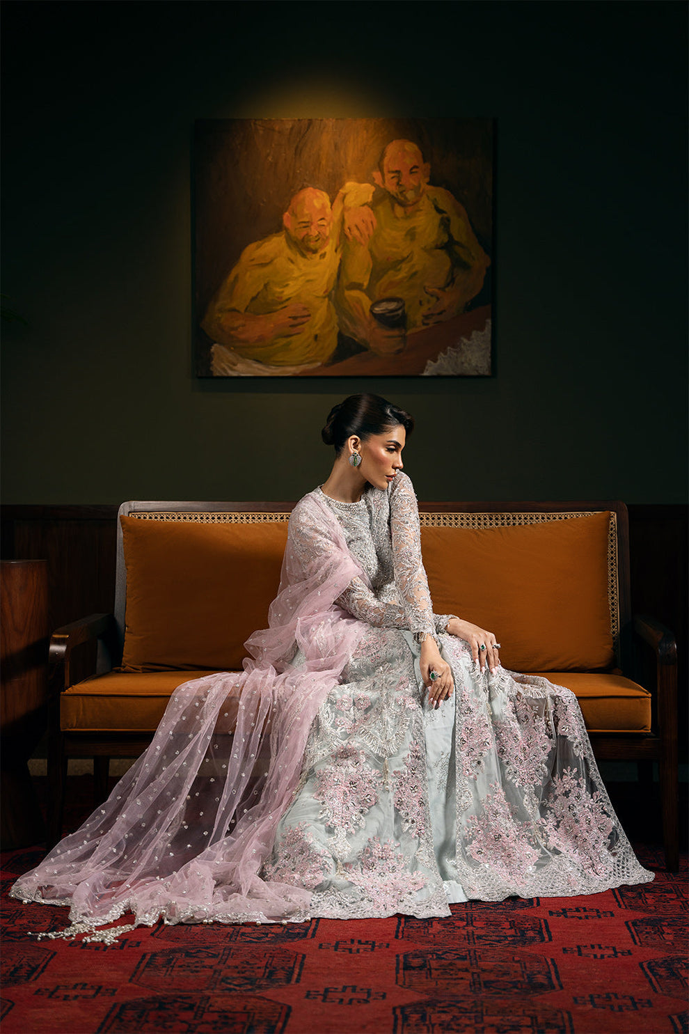 Saira Rizwan Kylo unstitched net ensemble featuring embroidered sequined and embellished front, back, sleeves, and panels, paired with an embroidered sequined net dupatta and raw silk lehenga with lining, perfect for weddings and formal occasions.