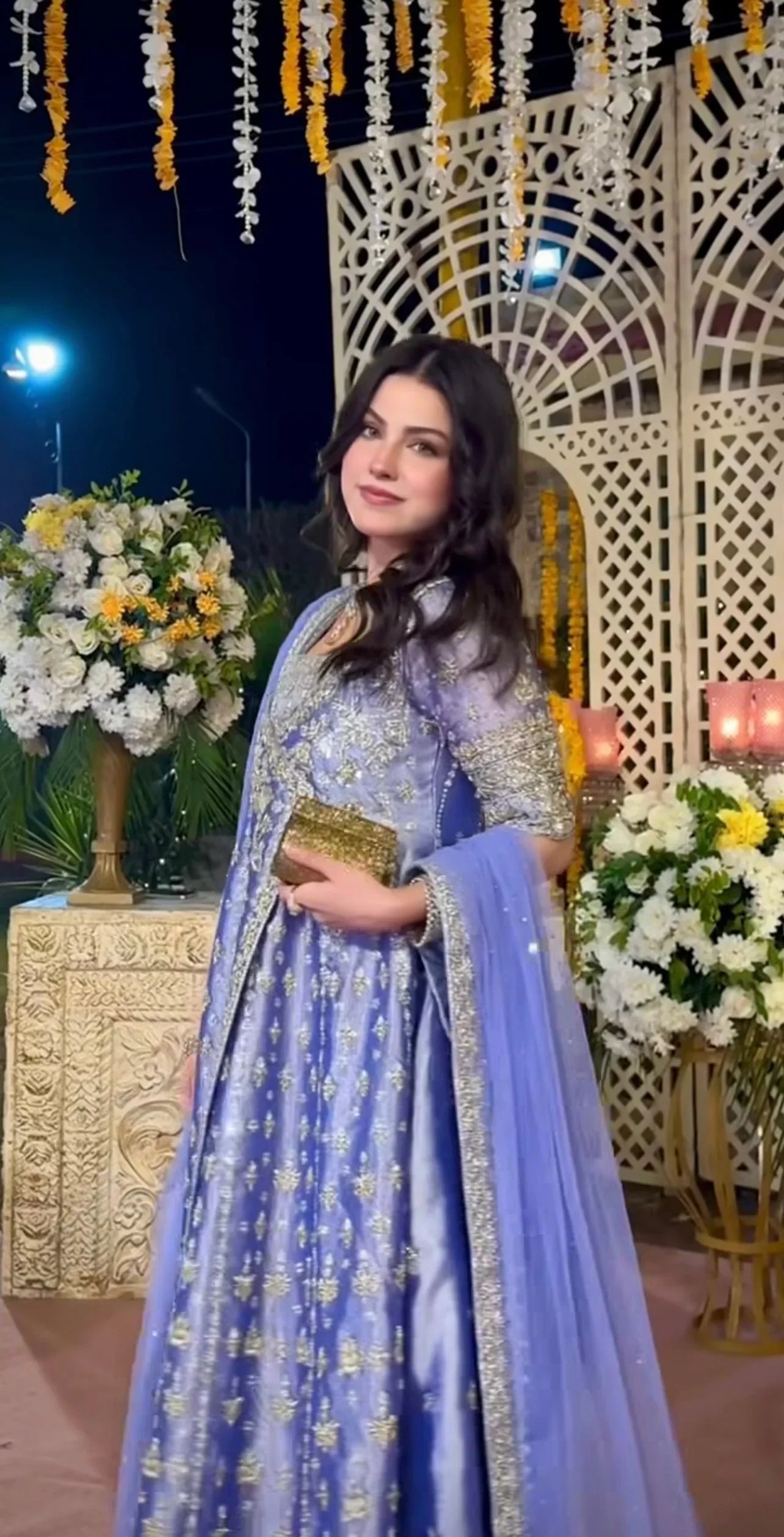 Haris Shakeel inspired Eyena ensemble in soft periwinkle-lilac featuring intricate silver zari, sequins, and resham embroidery delicately scattered across flowing panels with a richly embellished border, paired with a sheer net dupatta, perfect for festive occasions, mehndi functions, nikkah ceremonies, and formal gatherings.
