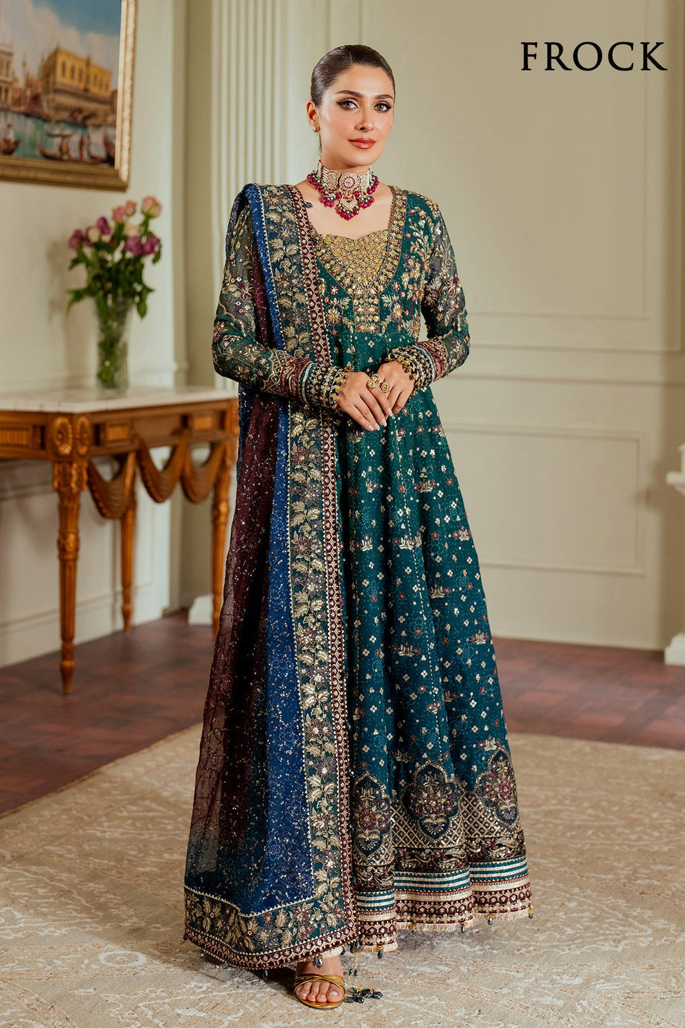 Baroque Chantelle embroidered chiffon three-piece ensemble featuring a digital chunri print with hand-embellished gotta, nakshi, and copper tilla at the neckline, adorned with sequins and embroidered borders, paired with a printed chiffon dupatta with organza and velvet embroidered border and dyed silk trousers, perfect for formal occasions and festive wear.