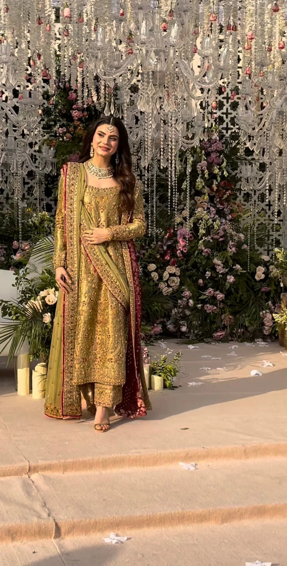 Haris Shakeel inspired pistachio green festive ensemble featuring a shirt with intricate embroidery and delicate embellishments creating a refined luminous texture, paired with a coordinated dupatta with rich contrasting borders and straight-cut trousers, perfect for wedding festivities, formal gatherings, and celebratory occasions.