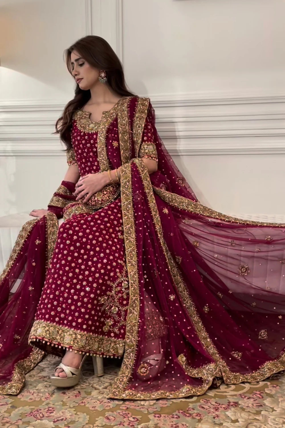 Haris Shakeel Aisha Afridi Pakistani designer formal ensemble crafted in rich tones with intricate embellishments and refined craftsmanship, featuring delicate details that blend tradition and sophistication, perfect for grand occasions and weddings.