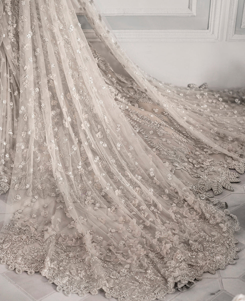  Republic Womenswear E-52 modern glamour ensemble featuring intricate embellishments and artful embroidery on luxurious fabric with a flattering flowing silhouette, perfect for galas, special occasions, and formal events.