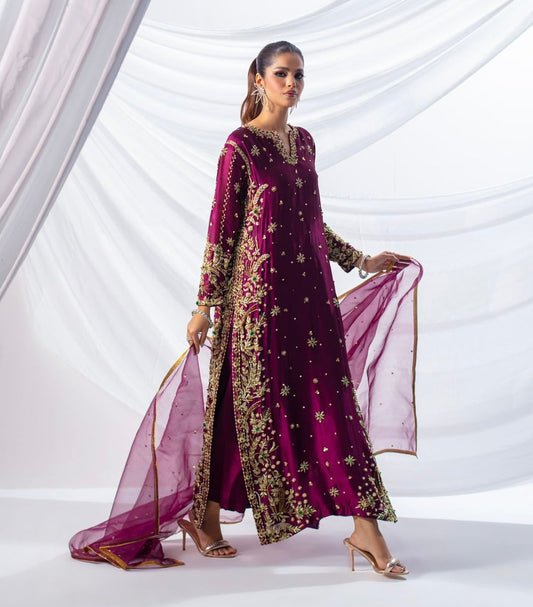 Batik Expressive Magenta dreamy magenta ensemble featuring a straight long heavily embellished shirt with zardozi techniques, stones, and beading, perfect for wedding festivities and formal occasions.