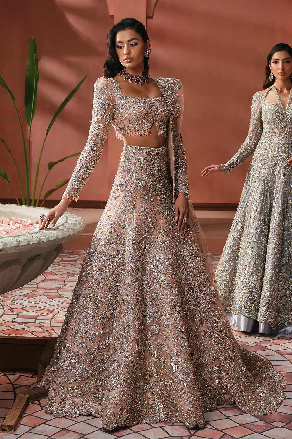 Soraya Catherine soft pink net bridal lehenga choli featuring intricate handwork with sparkling crystals, classic dabka embroidery, fine katdana detailing, and traditional mukesh work on a delicately embellished lehenga, paired with a matching net dupatta with coordinated detailing, perfect for wedding ceremonies, nikkah, and bridal receptions.