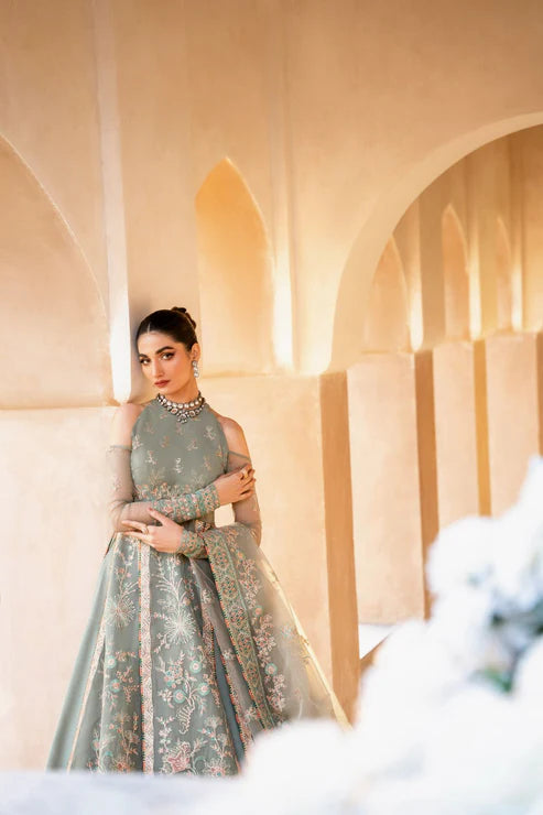 Gossamer Pakistani designer unstitched formal ensemble featuring intricate organza embroidery with components including embroidered blouse pieces, panels, borders, and dupatta, designed to be tailored into a lehnga or other silhouette, perfect for weddings and festive occasions.