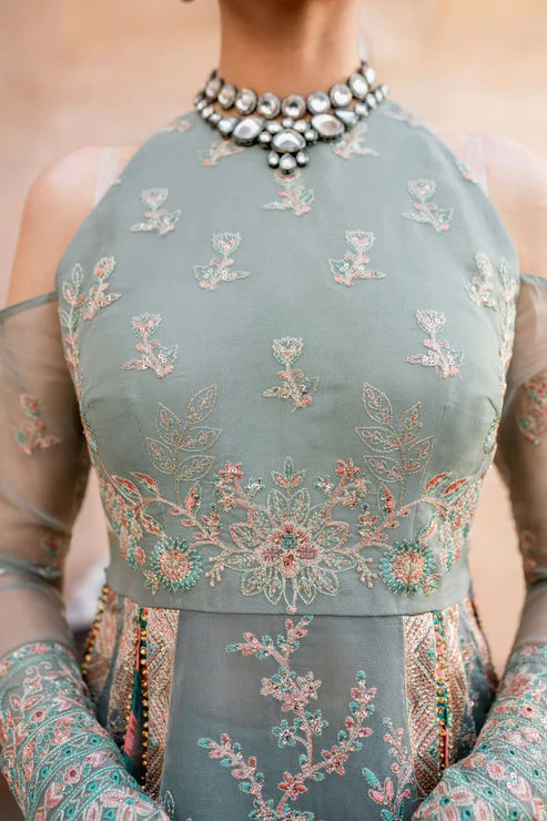 Gossamer Pakistani designer unstitched formal ensemble featuring intricate organza embroidery with components including embroidered blouse pieces, panels, borders, and dupatta, designed to be tailored into a lehnga or other silhouette, perfect for weddings and festive occasions.