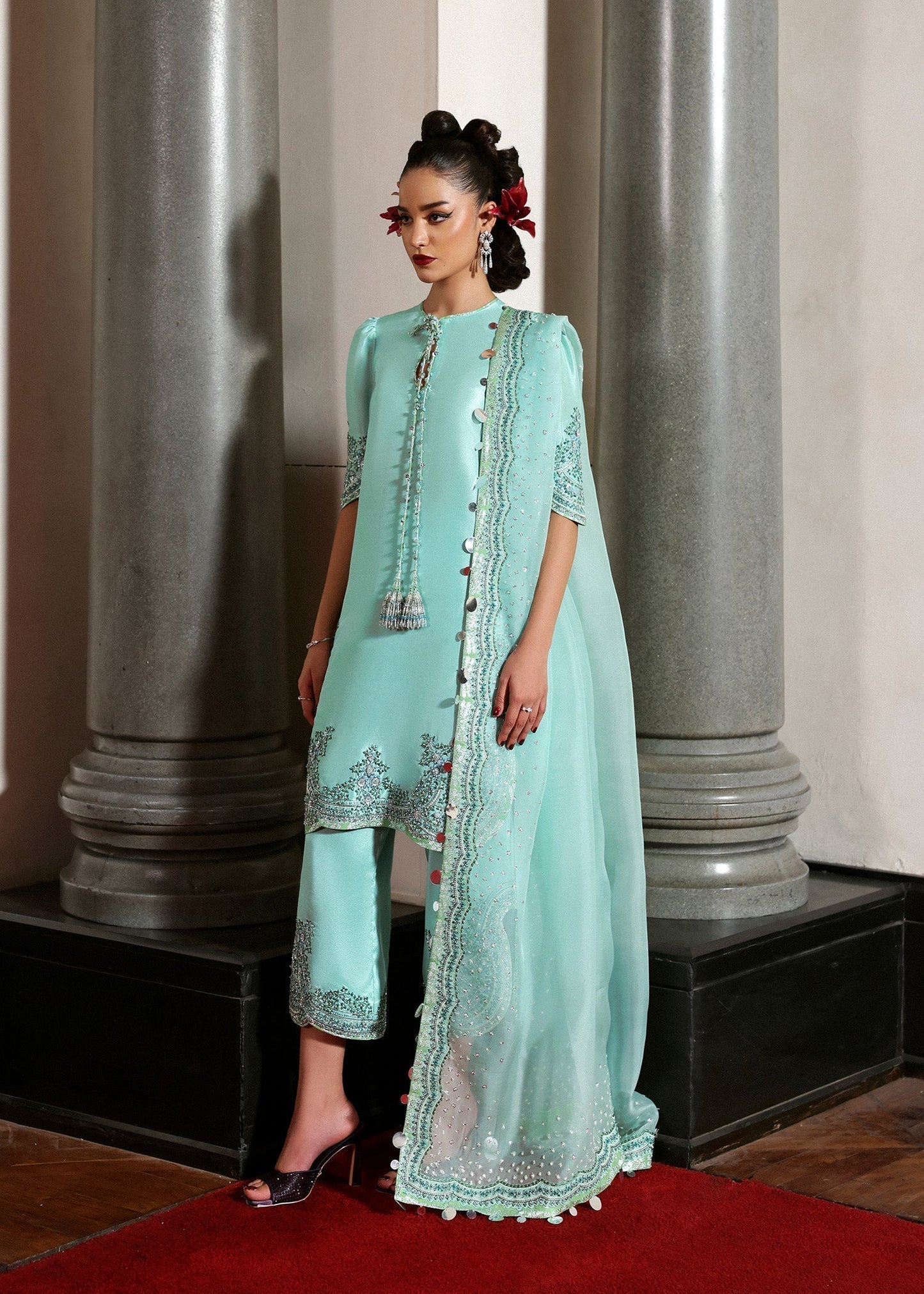 Hussain Rehar Mynt ensemble crafted from luxurious fabric featuring delicate embellishments with refined tailoring and graceful flow in soothing tones, paired with an accompanying dupatta, perfect for formal occasions and elegant celebrations.
