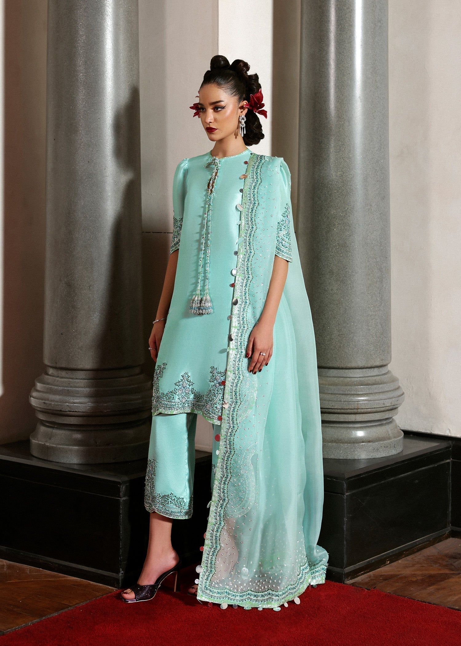 Hussain Rehar Mynt ensemble crafted from luxurious fabric featuring delicate embellishments with refined tailoring and graceful flow in soothing tones, paired with an accompanying dupatta, perfect for formal occasions and elegant celebrations.