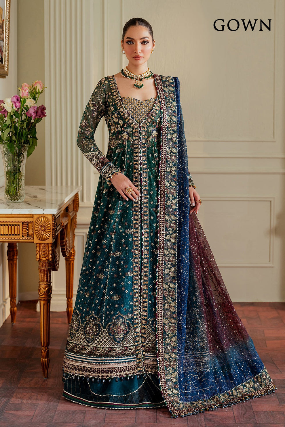 Baroque Chantelle embroidered chiffon three-piece ensemble featuring a digital chunri print with hand-embellished gotta, nakshi, and copper tilla at the neckline, adorned with sequins and embroidered borders, paired with a printed chiffon dupatta with organza and velvet embroidered border and dyed silk trousers, perfect for formal occasions and festive wear.
