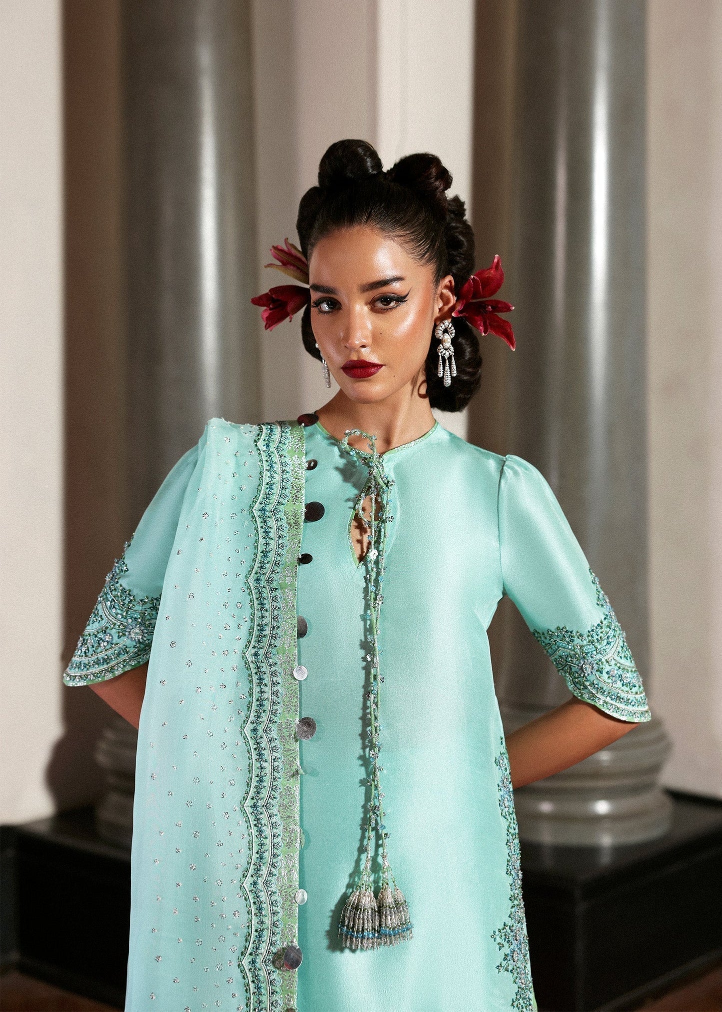 Hussain Rehar Mynt ensemble crafted from luxurious fabric featuring delicate embellishments with refined tailoring and graceful flow in soothing tones, paired with an accompanying dupatta, perfect for formal occasions and elegant celebrations.