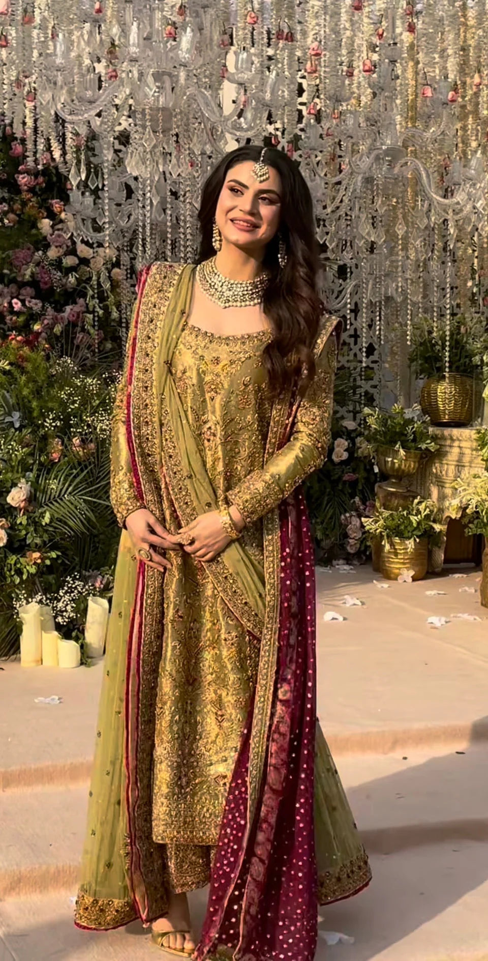 Haris Shakeel inspired pistachio green festive ensemble featuring a shirt with intricate embroidery and delicate embellishments creating a refined luminous texture, paired with a coordinated dupatta with rich contrasting borders and straight-cut trousers, perfect for wedding festivities, formal gatherings, and celebratory occasions.
