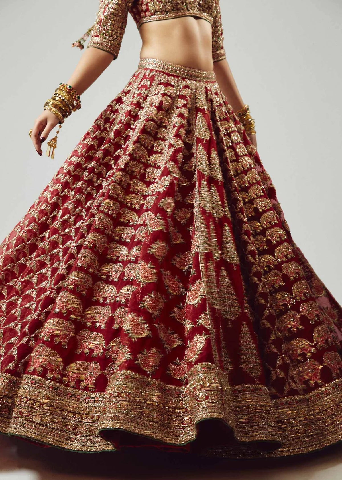 Hussain Rehar Raaqs red pure organza lehenga choli featuring intricate hand embellishments with rich dimensional finish, paired with a pure organza scallop cutwork dupatta that drapes gracefully with ethereal lightweight movement, perfect for bridal wear, weddings, receptions, and grand celebrations.