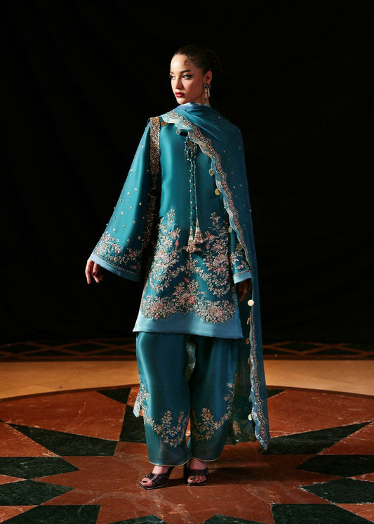 Hussain Rehar Verta ensemble featuring a refined silhouette with intricate embellishments and luxurious fabric in a fluid drape, paired with a beautifully detailed dupatta, perfect for formal occasions and elegant celebrations.