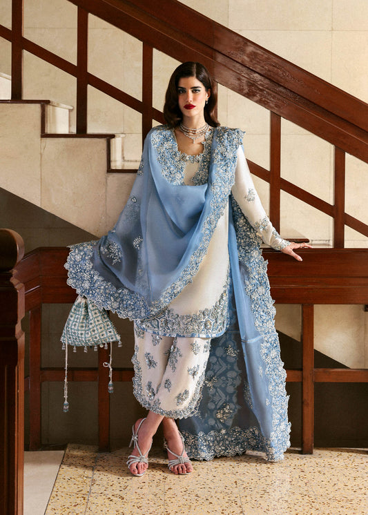 Hussain Rehar Virelle ensemble crafted in sumptuous fabric with delicate embellishments and refined craftsmanship, featuring a fluid silhouette that balances elegance and modern charm, paired with a beautifully detailed dupatta, perfect for special occasions and formal events.