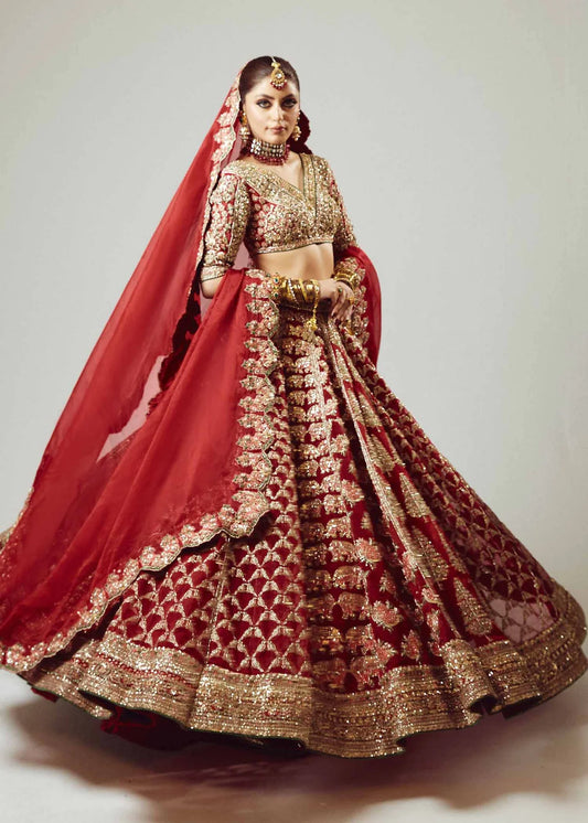 Hussain Rehar Raaqs red pure organza lehenga choli featuring intricate hand embellishments with rich dimensional finish, paired with a pure organza scallop cutwork dupatta that drapes gracefully with ethereal lightweight movement, perfect for bridal wear, weddings, receptions, and grand celebrations.