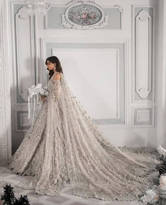  Republic Womenswear E-52 modern glamour ensemble featuring intricate embellishments and artful embroidery on luxurious fabric with a flattering flowing silhouette, perfect for galas, special occasions, and formal events.