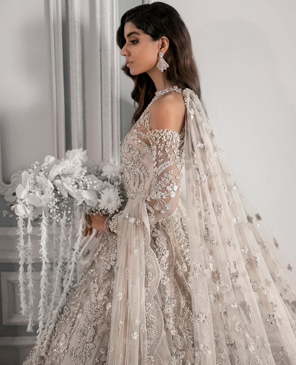  Republic Womenswear E-52 modern glamour ensemble featuring intricate embellishments and artful embroidery on luxurious fabric with a flattering flowing silhouette, perfect for galas, special occasions, and formal events.