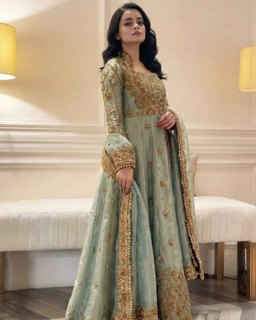 Haris Shakeel Urooj unstitched 3-piece bridal ensemble from the Wedding Luxury Myssory collection featuring exquisite hand embellishments and intricate embroidery with rich textures and sophisticated patterns that blend traditional bridal aesthetics with contemporary flair, crafted in premium quality fabric for customizable tailoring to create a regal wedding look.