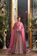  Fahad Hussayn Bagaai pink net bridal lehenga choli featuring intricate resham embroidery, fine sequin detailing, elaborate zardozi work, and hand-placed crystals on a delicate net fabric base, with a flowing embroidered lehenga, coordinated choli, and matching dupatta, perfect for wedding ceremonies, receptions, and grand bridal events.