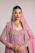  Fahad Hussayn Bagaai pink net bridal lehenga choli featuring intricate resham embroidery, fine sequin detailing, elaborate zardozi work, and hand-placed crystals on a delicate net fabric base, with a flowing embroidered lehenga, coordinated choli, and matching dupatta, perfect for wedding ceremonies, receptions, and grand bridal events.