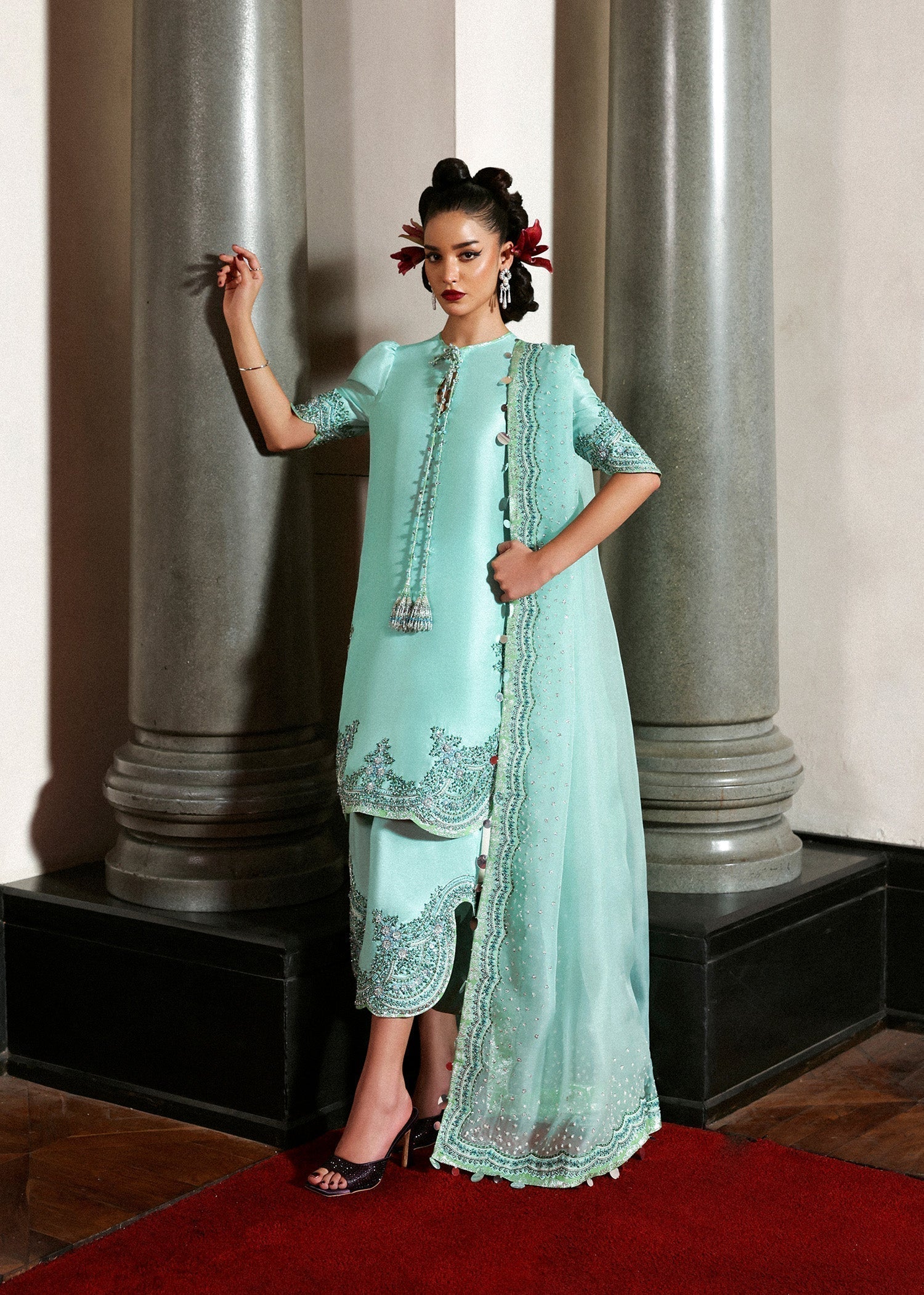 Hussain Rehar Mynt ensemble crafted from luxurious fabric featuring delicate embellishments with refined tailoring and graceful flow in soothing tones, paired with an accompanying dupatta, perfect for formal occasions and elegant celebrations.