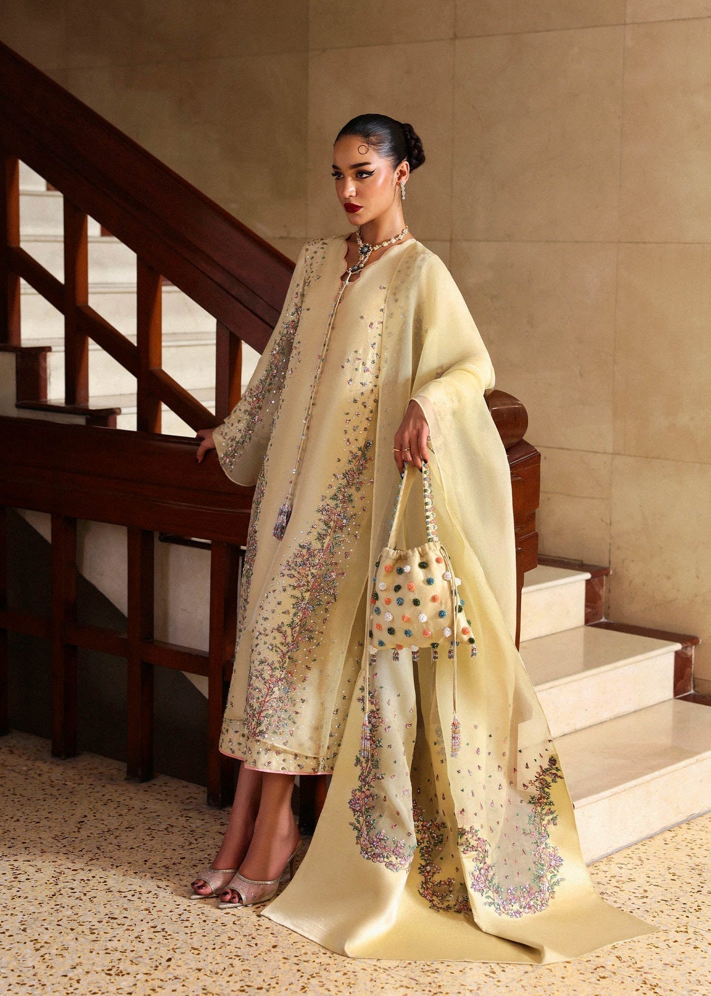 Hussain Rehar Ciel ensemble featuring a refined silhouette with subtle intricate embellishments and luxurious fabric in a graceful drape, paired with a delicately finished dupatta, perfect for formal occasions and elegant celebrations.