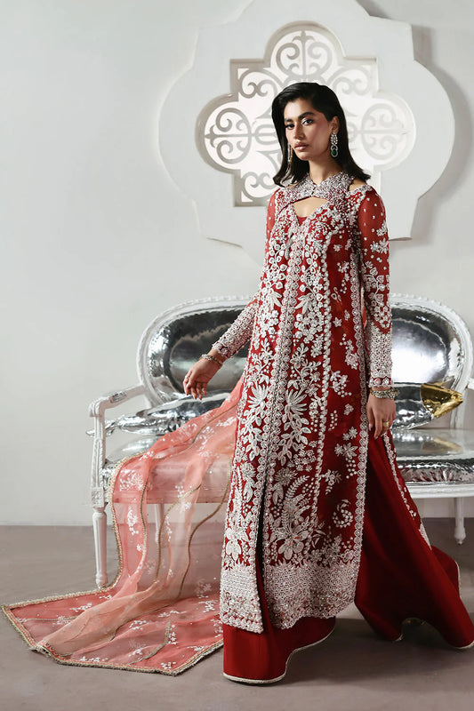 Soraya Solara Pakistani designer festive luxury ensemble with a soft luminous aesthetic and beautifully curated detailing, featuring a refined balance of texture and harmony, creating an effortlessly graceful couture look for modern festive occasions.
